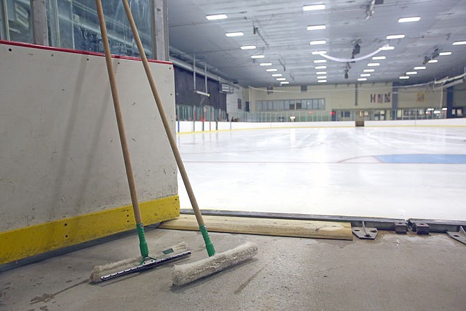 Fresh ice sits Wednesday at the Washington Park Ice Arena. After significant flooding earlier in the month, the rink is set to re-open on Saturday.