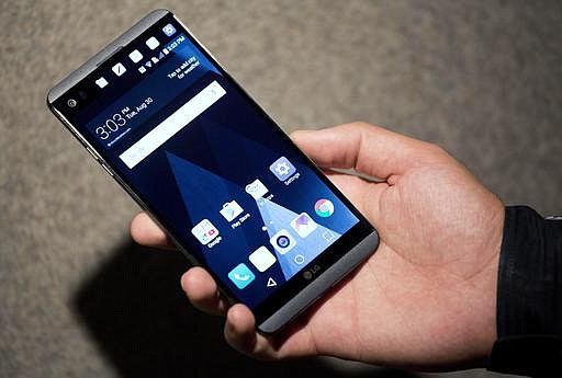 In this Tuesday, Aug. 30, 2016, file photo, the LG V20 is demonstrated in New York. The phone is the first to ship with Google's new Android Nougat software.