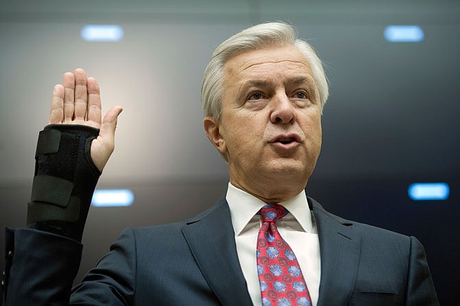 Wells Fargo CEO John Stumpf is sworn in on Capitol Hill Thursday in Washington prior to testifying before the House Financial Services Committee.