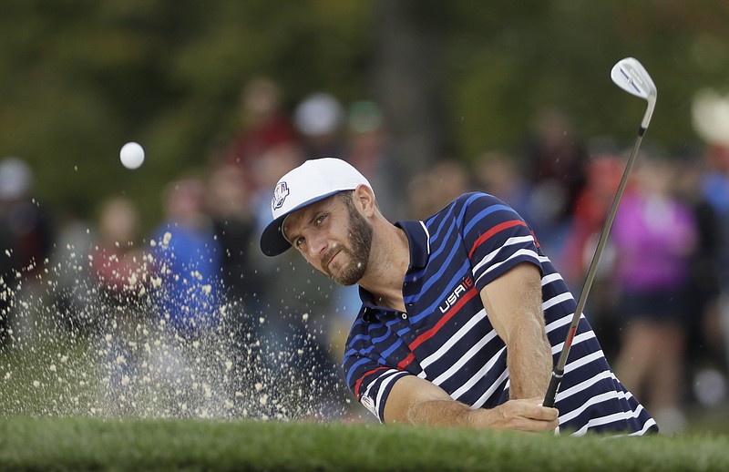 United States' Dustin Johnson hits from a bunker on the 12th hole during a practice round for the Ryder Cup golf tournament Thursday, Sept. 29, 2016, at Hazeltine National Golf Club in Chaska, Minn. 