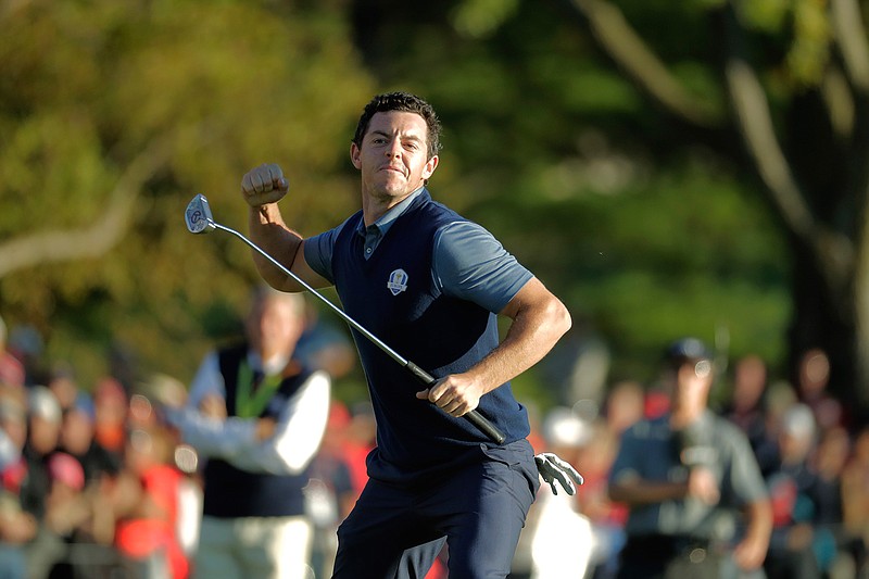 Europe's Rory McIlroy reacts after making his putt to win his match 3 & 2 during a four-balls match at the Ryder Cup golf tournament Friday, Sept. 30, 2016, at Hazeltine National Golf Club in Chaska, Minn. 