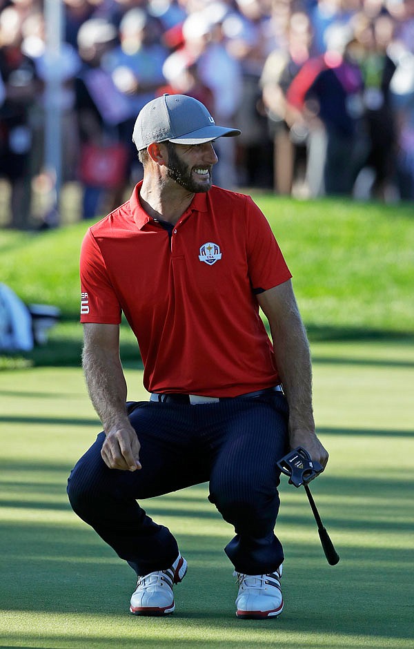 Dustin Johnson misses a birdie putt on the 13th hole during a four-balls match at the Ryder Cup on Friday at Hazeltine National Golf Club in Chaska, Minn. 