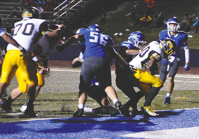 Fulton junior running back Ammod Davis busts his way into the end zone on a 3-yard touchdown run in the third quarter of an NCMC matchup at Boonville on Friday, Sept. 30, 2016. Davis broke a 14-all tie with a 75-yard touchdown run in the fourth quarter to help lift the Hornets to a 22-20 win over the Pirates.