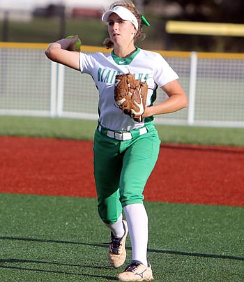 Blair Oaks shortstop Sydney Wilde fires a throw to first in Thursday's win against Russellville in California.