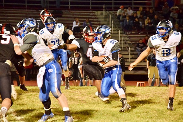 South Callaway senior fullback Harley Kight carries the ball in the Bulldogs' 69-0 Eastern Missouri Conference rout at Bowling Green last Friday night.