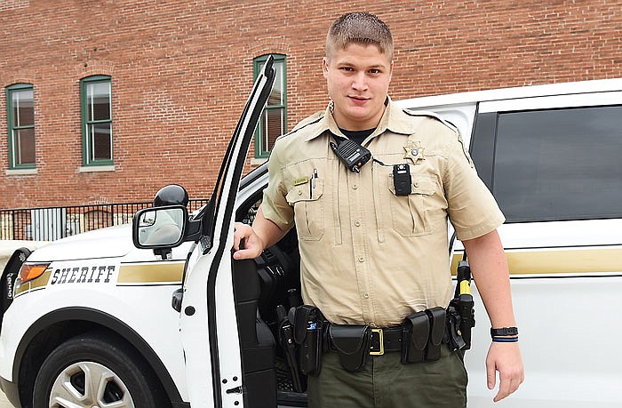 Deputy Shawn Claypool steps out of his vehicle wearing the newly issued body camera from the Cole County Sheriff's Department. The department has outfitted all road, prisoner transport and civil deputies, along with the animal control and school resource officers with the cameras.