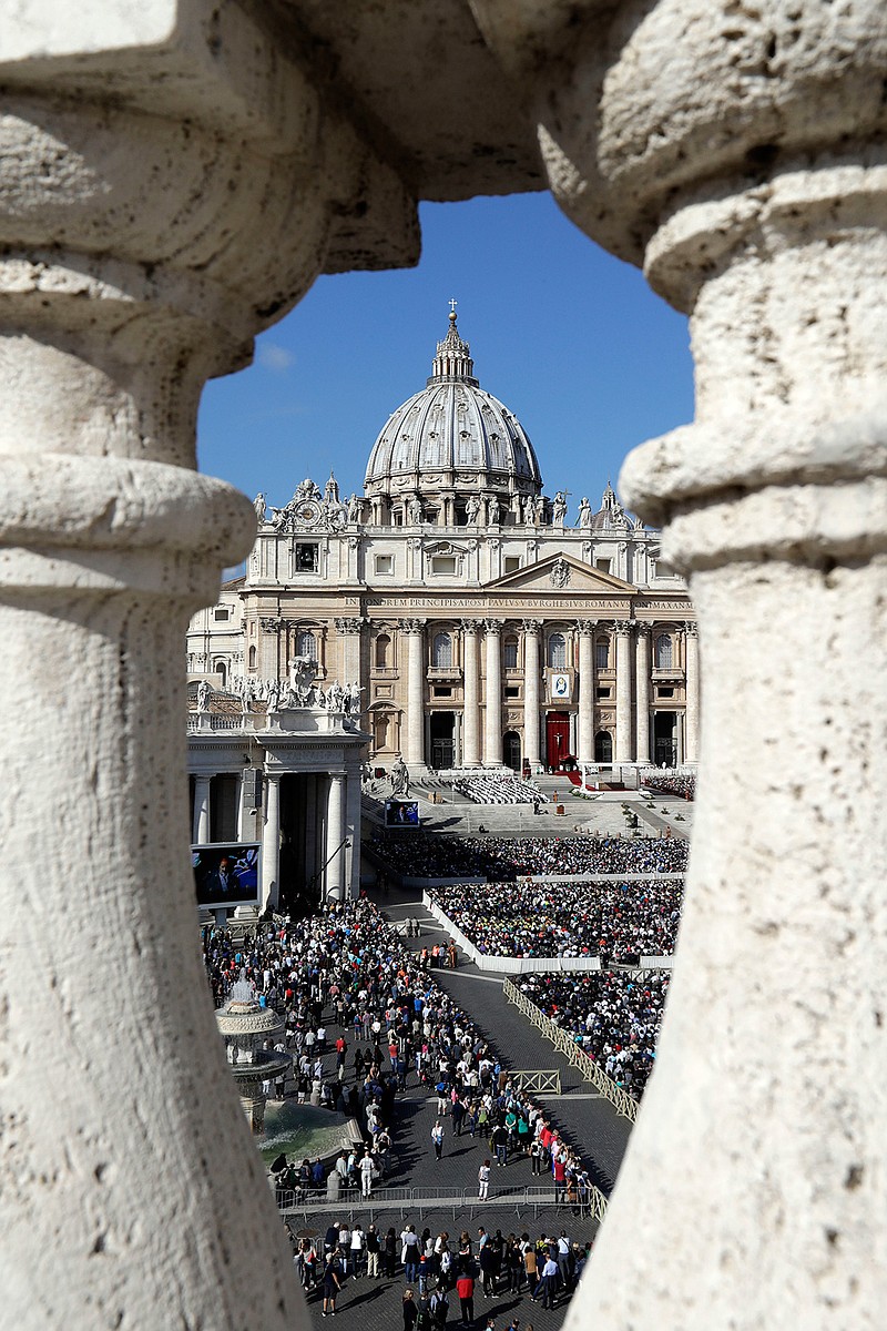 People gather in St. Peter's Square, at the Vatican, as Pope Francis celebrates a jubilee mass, Sunday, Oct. 9, 2016. 