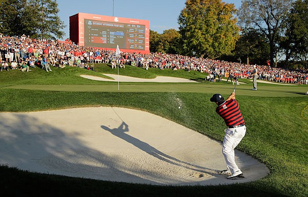 Phil Mickelson hits from a bunker on the 16th hole during a four-ball match earlier this month at the Ryder Cup at Hazeltine National Golf Club in Chaska, Minn.