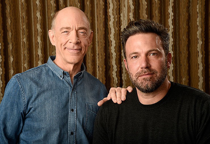J. K. Simmons, left, and Ben Affleck pose in Los Angeles to promote their film, "The Accountant."