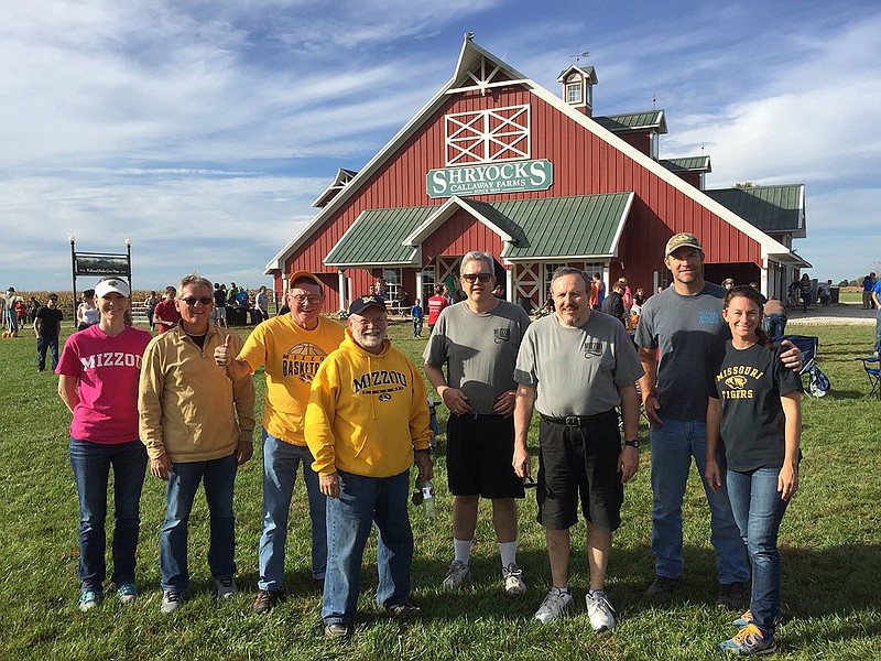 Among the Mizzou alumni who enjoyed a fall day at Shryock's Corn Maze on Oct. 9 were, from left, Melanie Czeschin, Mike Shindler, Joe Holt, Denton Kurtz, Mike Conner, Tim Conner, Gabe Craighead and Amy Craighead. 