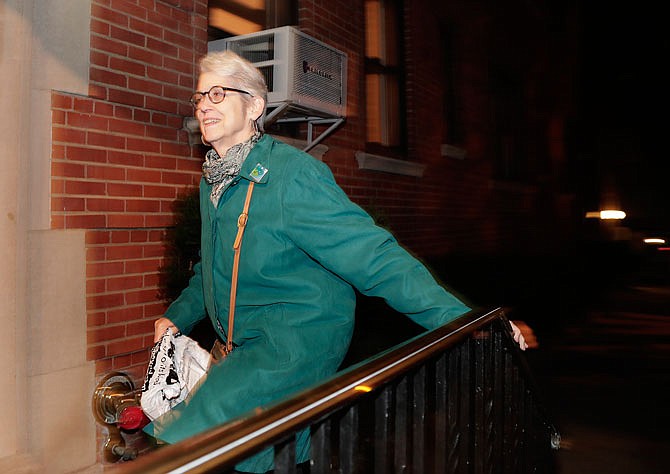 Jessica Leeds arrives at her apartment building Wednesday in New York. Leeds was one of two women who told the New York Times Republican presidential candidate Donald Trump touched her inappropriately. 