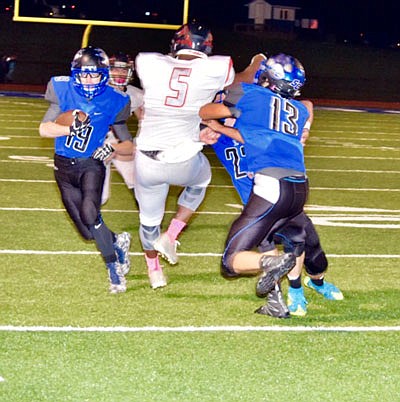 South Callaway senior cornerback Andrew Buckner returns one of the Bulldogs' five interceptions in last week's 62-30 EMO rout of Clopton/Elsberry in Mokane.