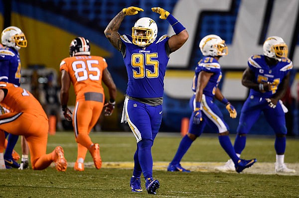 Chargers defensive end Tenny Palepoi reacts after a missed field goal by the Broncos during the second half of Thursday night's game in San Diego.