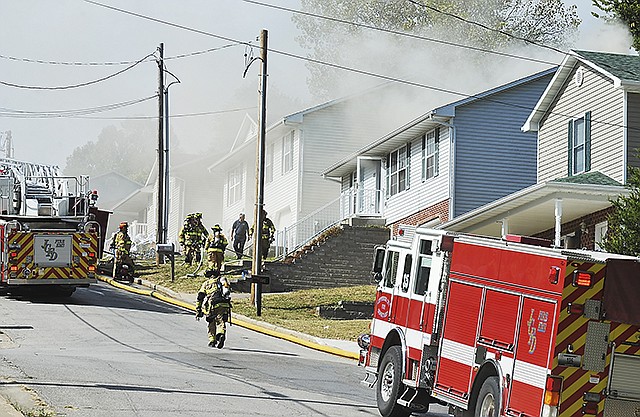 Jefferson City firefighters responded to a structure fire at 12:49 p.m. Friday at 1504 Edmonds St. There was heavy smoke showing when they arrived, and they knocked down the flames inside in a matter of minutes. No one was home at the time of the blaze.