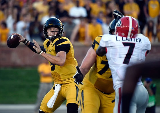 Missouri quarterback Drew Lock and the Tiger offense will face a stiff challenge this afternoon against the defense of the Florida Gators in Gainesville, Fla.