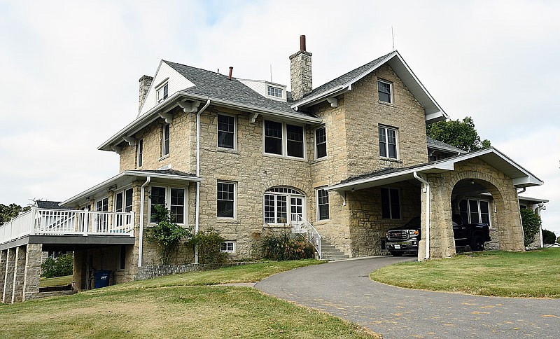 The five-bedroom McHenry home, at 1427 Green Berry Road in Jefferson City, features 17-inch-thick locally quarried stone.