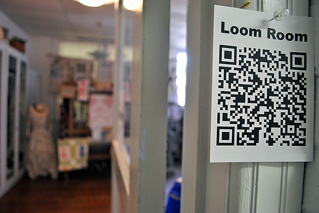This newly added QR code is posted near the Loom Room entrance at the Camden County Museum in Linn Creek to allow guests to scan with their smartphone and learn additional information about the items that are part of the exhibit.