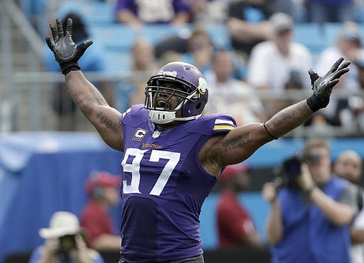  In this Sept. 25, 2016, file photo, Minnesota Vikings' Everson Griffen celebrates after a sack against the Carolina Panthers during an NFL football game in Charlotte, N.C. 