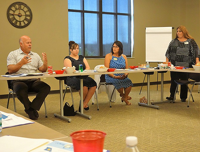 Gary Jongermann, left, speaks at the business round table event Monday afternoon. The Callaway Chamber of Commerce organized the meeting to discuss the current state of Callaway County.
