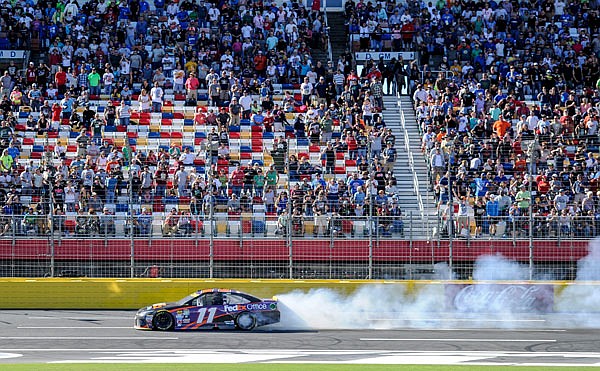 Denny Hamlin suffers an engine failure late in the Sprint Cup Series race earlier this month at Charlotte Motor Speedway in Concord, N.C. Hamlin is one of the big-name drivers trying to advance to the third round in the Chase.