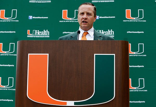 In this Aug. 9, 2013, file photo, Miami's athletic director Blake James speaks during a media day in Coral Gables, Fla. Miami's three-year NCAA probation largely stemming from the actions of former booster Nevin Shapiro ends Friday.