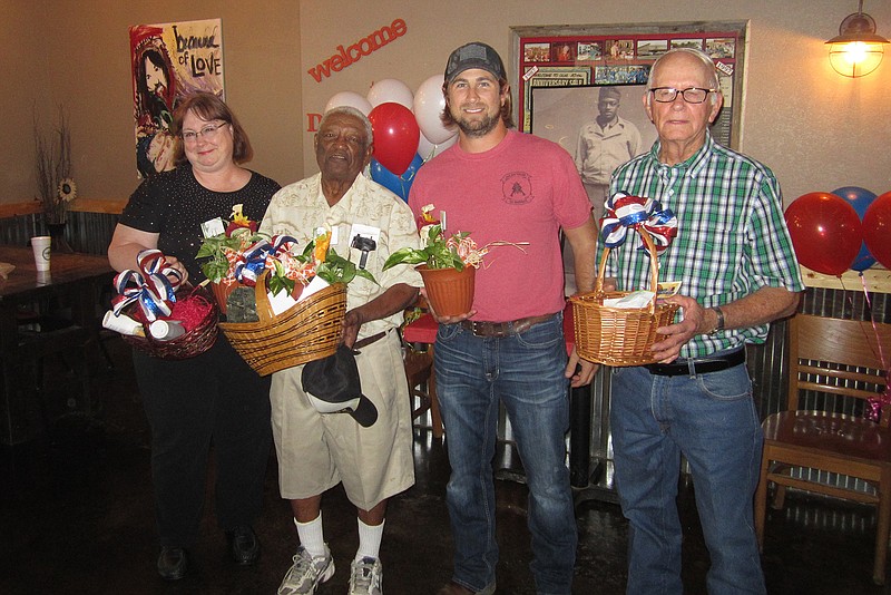The Maud Beautification Club recently honored four veterans for their service. They are, from left, Air Force veteran Cindy Melton, Army veteran Marshall Terry, and Marine veterans Heath Shumate and Winfred Braley. "Our club just wanted to do something special for a few of the veterans of our small town. There had been so much bad news in and around our town lately that we wanted to do something positive," said Kyle DeLaughter, club president. Club members plan to do these types of functions every once in a while, he said.