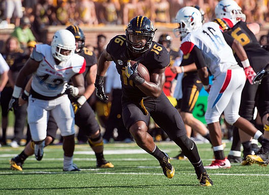 Missouri running back Damarea Crockett heads for the end zone on an 11-yard touchdown run during a game against Delaware State last month at Faurot Field.