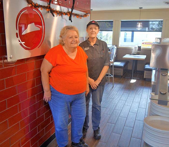 Ellia Hathkamp, left, and restaurant manager Faye Brosnihan stand inside the recently remodeled Pizza Hut building in Fulton.