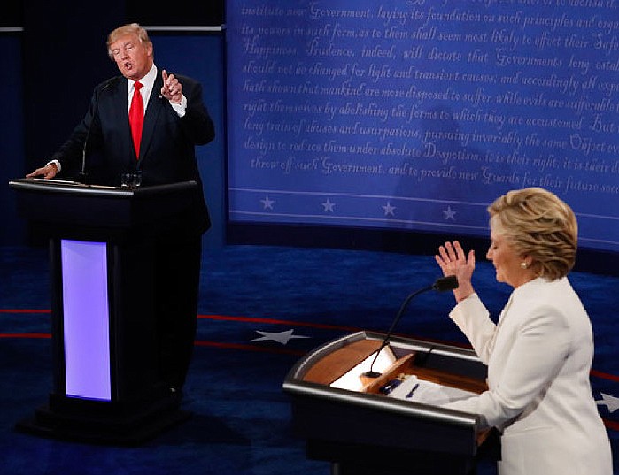 Democratic presidential nominee Hillary Clinton debates with Republican presidential nominee Donald Trump during the third presidential debate Wednesday at UNLV in Las Vegas. 