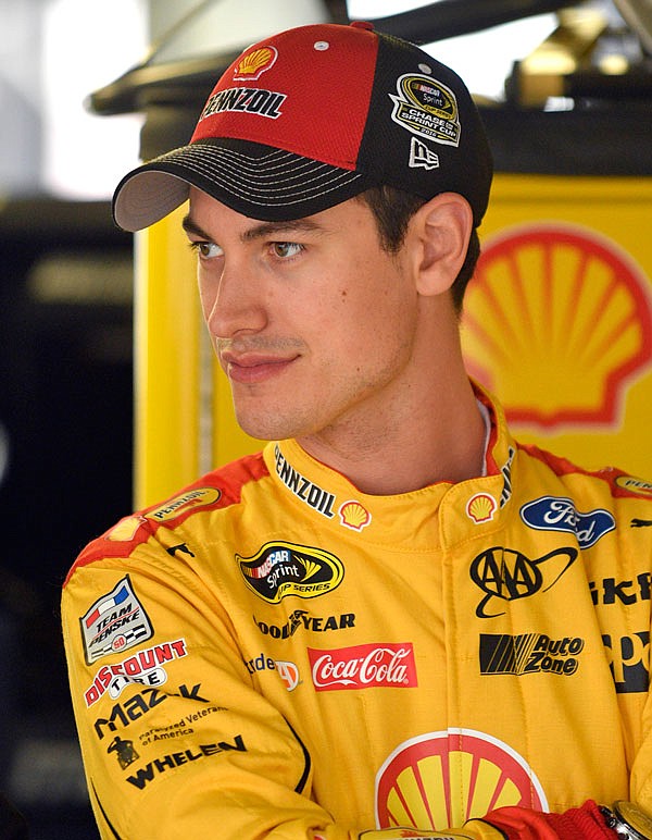 NASCAR Sprint Cup Series driver Joey Logano waits for Friday's practice session to start at Kansas Speedway in Kansas City, Kan. Logano enters Sunday's race at Talladega tied for eighth in the Chase points standings.