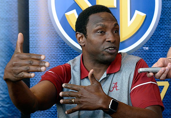 Alabama coach Avery Johnson answers a question during Wednesday's Southeastern Conference media day in Nashville, Tenn.