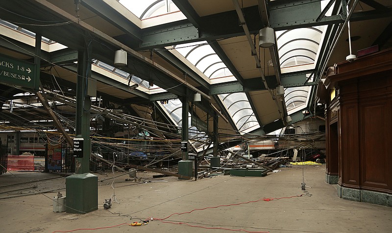 This Oct. 1, 2016, file photo provided by the National Transportation Safety Board shows damage done to the Hoboken Terminal in Hoboken, N.J., after a commuter train crash that killed one person and injured more than 100 others. New Jersey legislators voted to grant themselves subpoena power as they begin to look into last month's New Jersey Transit train crash. 