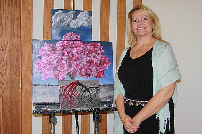 Suzanne Miller explained that the clouds in her painting represented the hemispheres of her brain (the right one has a silver lining: her new creativity), and the roots her damaged carotid artery. The pink indicates hope.
