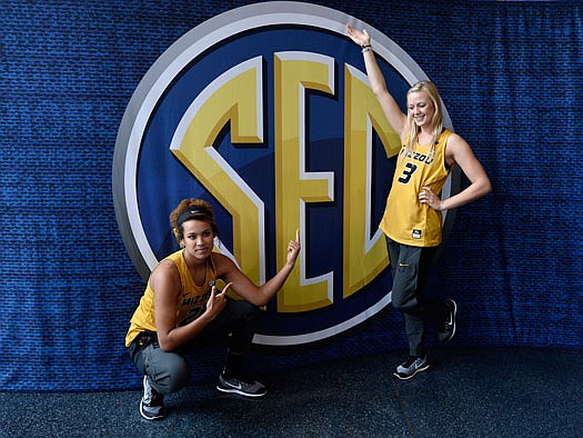 Missouri teammates Cierra Porter (left) and Sophie Cunningham pose for a photograph Thursday during the Southeastern Conference women's basketball media day in Nashville, Tenn.