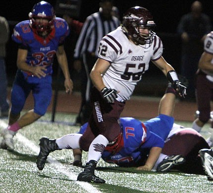 Jacob Mason of School of the Osage looks to make a block during last Friday night's game against California.