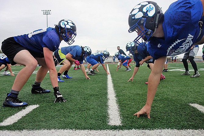 The South Callaway linemen participate in practice Wednesday afternoon in Mokane. The offensive and defensive line this season has been the foundation for the team's undefeated record, head coach Zack Hess said.