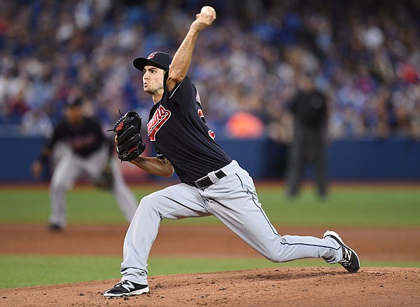 Indians starting pitcher Ryan Merritt delivers to the plate against the Blue Jays during Wednesday's Game 5 of the American League Championship Series in Toronto.