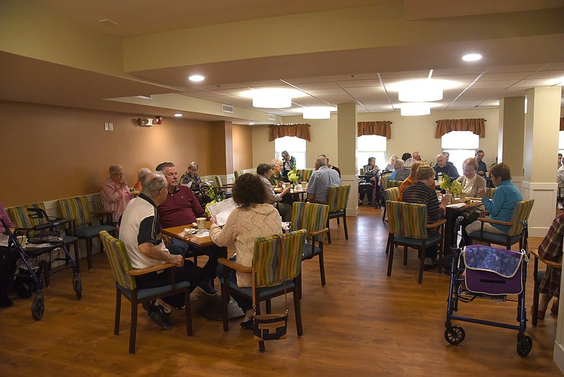 Heisinger Bluffs in Jefferson City held a ribbon cutting ceremony Friday, Oct. 21, 2016 for its newly renovated section, including a bistro, which is open to the residents as well as the public.