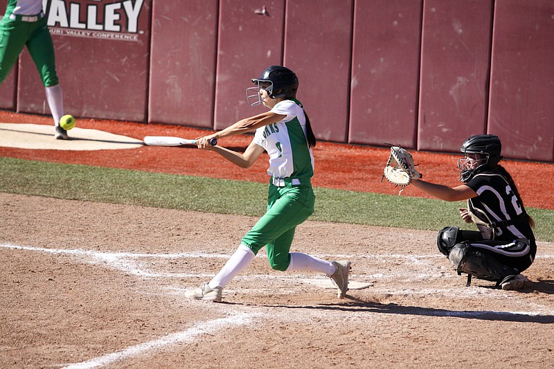 Blair Oaks designated player Hannah Schroeder takes a cut on a pitch in the eighth inning of the Class 2 state championship game against Centralia Saturday, Oct. 22, 2016 at Killian Sports Complex in Springfield, Mo. Schroeder had an RBI single during the at-bat, scoring Emilee Jones.