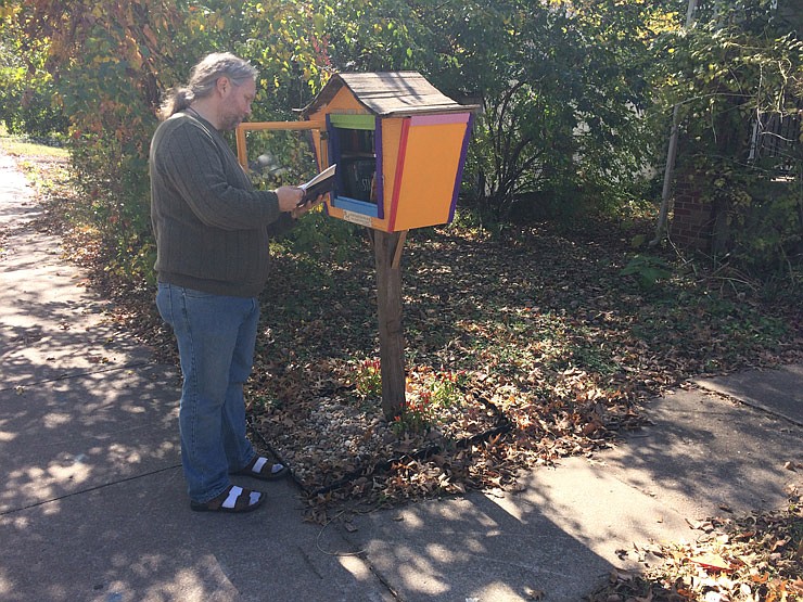 Cory Rickabaugh and his wife Tessi created this Little Free Library in front of their home near Bluff Street and St. Louis Avenue in Fulton.
