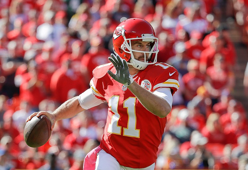 Kansas City Chiefs quarterback Alex Smith (11) looks for a receiver during the first half of an NFL football game against the New Orleans Saints in Kansas City, Mo., Sunday, Oct. 23, 2016. 