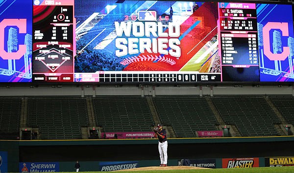 Danny Salazar of the Indians pitches a simulated game during practice Sunday in Cleveland.