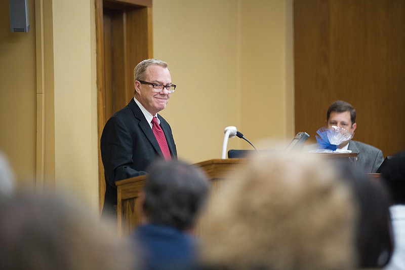 Gary Gibbs, executive director of the Texas Commission on the Arts, discusses the Texarkana Arts and Historic District's recent Texas Cultural District designation Monday evening during a City Council meeting.