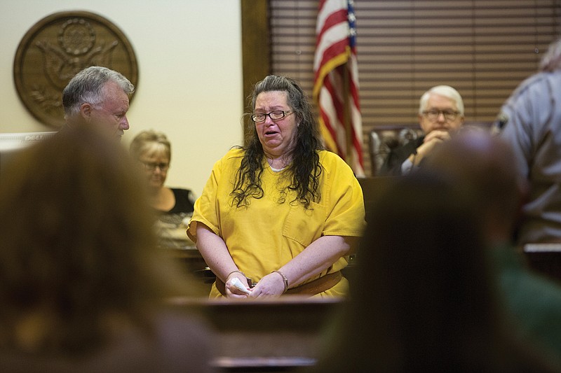 Tracie Dierks sobs Monday as she apologizes to the family and friends of Catlin Caskey after pleading guilty to second-degree murder for the Jan. 23 shooting death of the 17-year-old during a birthday party.  