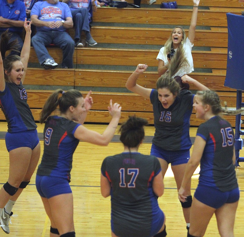 California celebrates after scoring a point in Saturday's loss to Villa Duchesne.