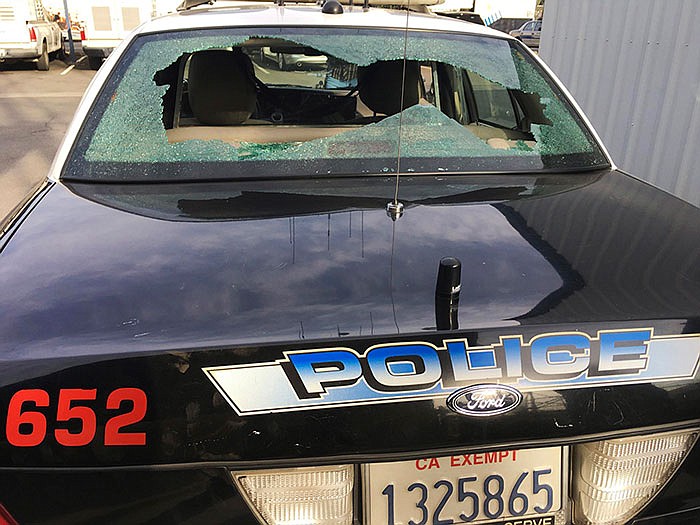 A photo shows a police car that was shot at in Madera, Calif.