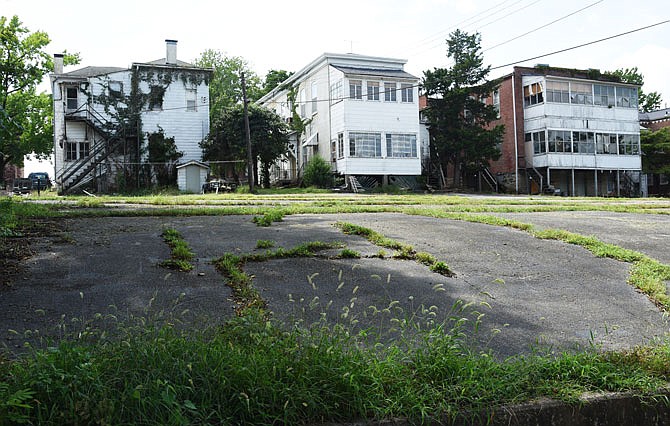 This view is of the rear of several properties in the 400 block of Capitol Avenue that are among the blighted ones to be acquired through eminent domain by the Jefferson City Housing Authority. 