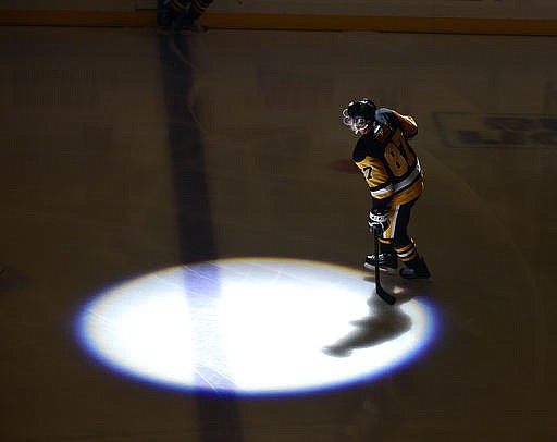 Pittsburgh Penguins center Sidney Crosby (87) skates out before the start of an NHL hockey game against the Florida Panthers on Tuesday, Oct. 25, 2016, in Pittsburgh. It was Crosby's first game of the season after sitting out the Penguins first six games with concussion issues. 