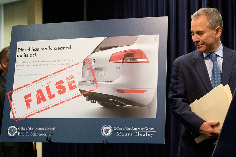 In this July 19, 2016, file photo, New York Attorney General Eric Schneiderman announces a lawsuit against Volkswagen in New York. A federal judge in San Francisco is facing a deadline on whether to approve a nearly $15 billion deal over Volkswagen's emissions cheating scandal that gives most affected car owners the option of having the company buy back their vehicles. U.S. District Judge Charles Breyer said at a hearing last week that he was strongly inclined to give the deal final approval and would issue a ruling by Tuesday, Oct. 25, 2016. 