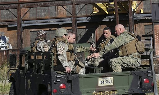 Roanoke Sheriff's Office SWAT team, along with several agencies, responded to a fatal shooting at FreightCar America in Roanoke, Va., Tuesday morning, Oct. 25, 2016.